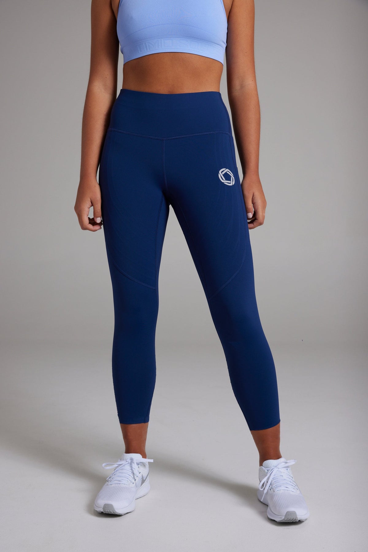 Women's POWERSENSE cropped compression running leggings in United in Navy - product photo 1 of 6