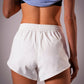 Women's EVERYWEAR 4-inch lined running shorts in Iceberg White - product photo 4 of 4