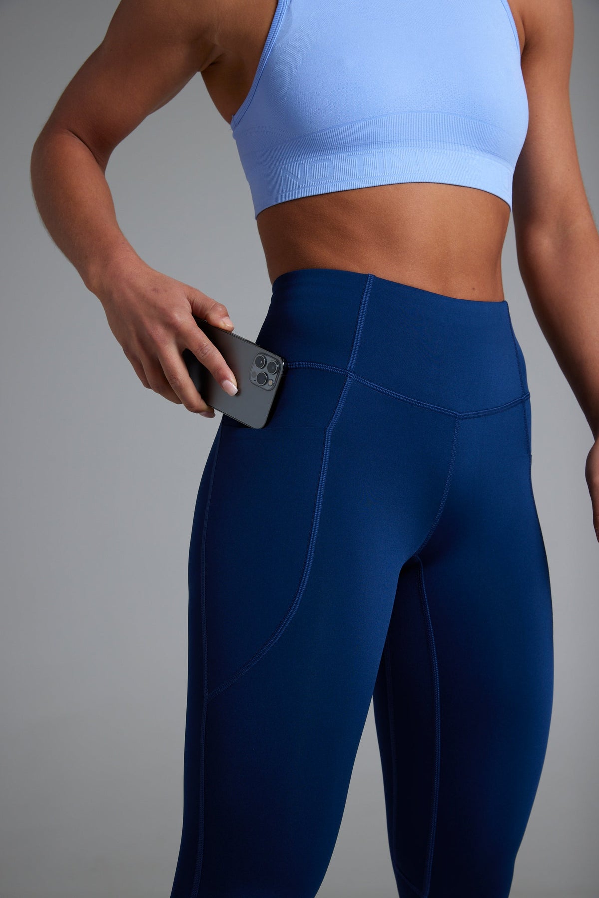Women's BODYSENSE cropped running leggings in United in Navy - product photo 1 of 6
